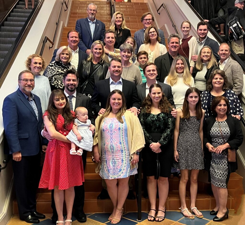 Group Shot on stairs cropped newsletter